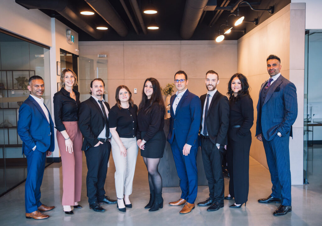 Nine western chartered advisors team members standing in a line